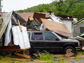 A view of vehicle damaged after Tropical Storm Ernesto hit Fajardo, Puerto Rico, on August 14, 2024.