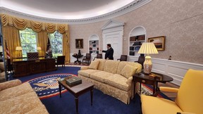 White House Historical Association president Stewart D. McLaurin stands inside the Oval Office replica. SARA SHANTZ PHOTO