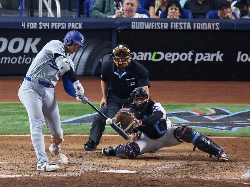 Shohei Ohtani becomes first player in major league history to hit 50 homers and steal 50 bases in a season