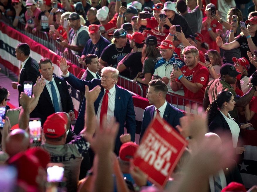 Republican presidential nominee, former U.S. President Donald Trump leaves a campaign event, his first since a man carrying a rifle was arrested Sunday near where Trump was playing golf at his club in Florida, in the Dort Financial Center on September 17, 2024 in Flint, Michigan. Trump was playing an unscheduled game with real estate developer Steve Witkoff at the Trump International Golf Club in West Palm Beach when the man was spotted by security.