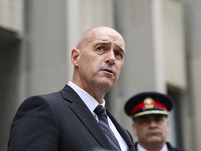 President of the Toronto Police Association, Jon Reid, speaks to members of the media following a not guilty verdict for Umar Zameer, in Toronto on Sunday, April 21, 2024.