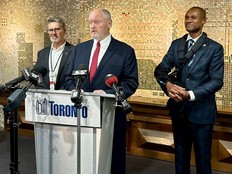 Gregory W. Percy, centre, speaks to the media after being approved to take over as interim TTC CEO starting Monday, Sept. 9, 2024.