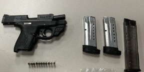 Toronto Police say a Smith and Wesson handgun was seized during the arrest of a 21-year-old man in the Sudbury St. and Queen St. W. area.