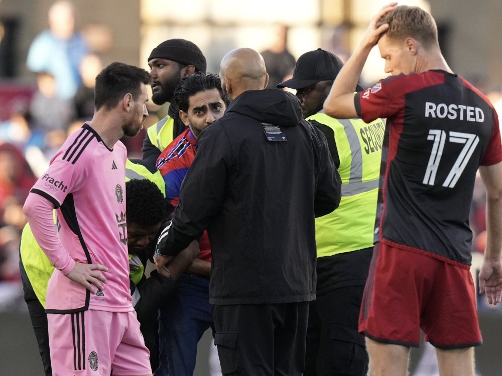 Lionel Messi takes selfie with young fan who ran onto Toronto field ...