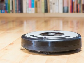 Top Stories Tamfitronics Used robotic vacuum cleaner closeup.