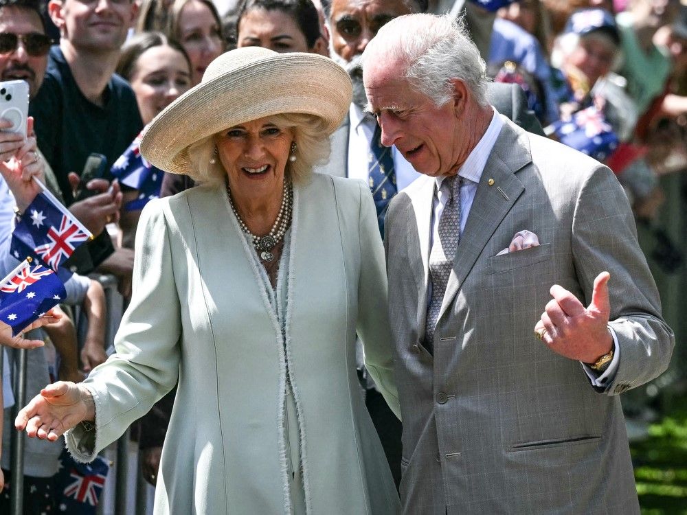 Children greet King Charles III and Queen Camilla outside Sydney church