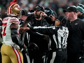 In this file photo, Dre Greenlaw of the San Francisco 49ers exchanges words with Philadelphia Eagles head coach Nick Sirianni and Dom DiSandro at Lincoln Financial Field on Dec. 3, 2023 in Philadelphia, Pa.