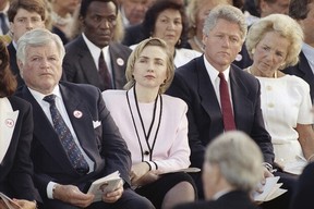 Sen. Edward Kennedy, from left, first lady Hillary Rodham Clinton, President Bill Clinton and Ethel Kennedy, right, listen to a remembrance delivered by Rep. Joseph P. Kennedy II during a memorial Mass in honor of Robert F. Kennedy on the 25th anniversary of his death at the Arlington National Cemetery in Arlington, Va., June 7, 1993. (AP Photo/Marcy Nighswander, File)