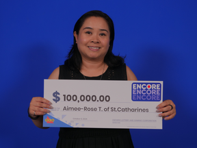 Top Stories Tamfitronics St. Catherines lottery winner Aimee Rose-Tupaz.