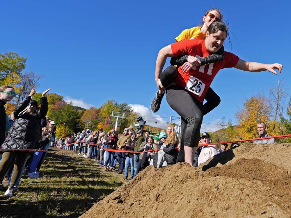 Mud, beer and cash: Annual wife-carrying championship attracts competitive couples to Maine