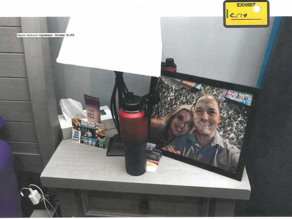  Juliana Peres Magalhaes and Brendan Banfield in a photograph on the nightstand of Banfield’s main bedroom on Oct. 13, 2023.