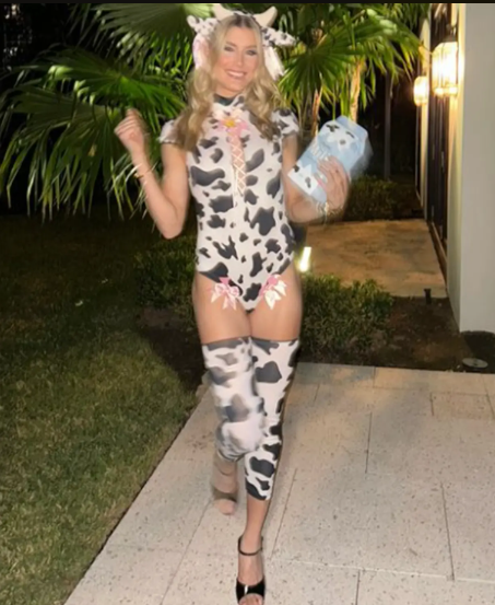 Eugenie Bouchard wears a cow costume for Halloween in 2024.
