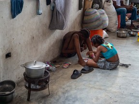 Children gather in a displacement camp