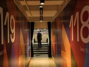 Keith Pelley, President and CEO of Maple Leaf Sports & Entertainment looks out over the arena as he stands in the newly renovated area on the concourse level at the Scotiabank Arena in Toronto, on Tuesday Oct. 8, 2024.