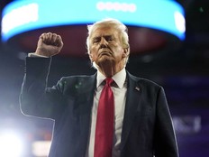 Republican presidential nominee former president Donald Trump gestures at a campaign rally at the Santander Arena, Wednesday, Oct. 9, 2024, in Reading, Pa.