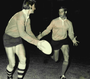 PROS: Chris Dawson passes the ball to his brother Paul. ETTY