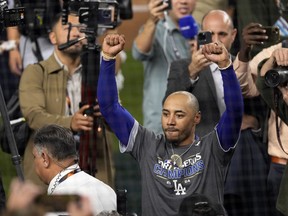 Los Angeles Dodgers' Mookie Betts celebrates after the Dodgers beat the New York Yankees in Game 5 to win the baseball World Series, Thursday, Oct. 31, 2024, in New York.