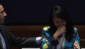 Josh Matlow comforts Lily Cheng during discussion about proclaiming December as Christian Heritage Month