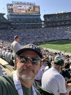 Jon McCarthy in his seat at Lambeay Field before the Packers-Texans game in October.