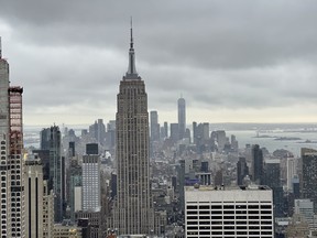 The Empire State Building is seen from the Top of the Rock observation deck at the Rockefeller Center. IAN SHANTZ/TORONTO SUN