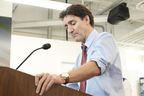 Prime Minister Justin Trudeau speaks to media at Vince’s Market, a grocery store in Sharon, Ontario, on Thursday November 21, 2024. THE CANADIAN PRESS/Chris Young