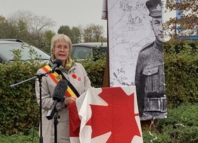 Zonnebeke Mayor Ingrid Vandepitte speaks during a ceremony honouring Alex Decoteau, where a plaque was unveiled in the area where the Cree man was killed during the First World War, on Indigenous Veterans Day on Friday, Nov. 8, 2024.