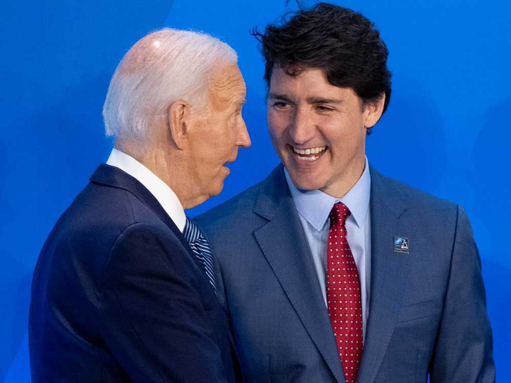 u.s. president joe biden and prime minister justin trudeau are pictured onstage before a group photo during the 2024 nato summit on july 10, 2024 in washington, d.c.
