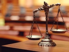 A judge dismissed a lawsuit launched by a man who took offence to an English-only “caution wet floor” sign in a government building.