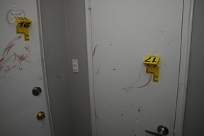 A Toronto Police evidence photo shows blood stains on doors inside the Etobicoke apartment on Bergamot Ave. Ontario Superior Court of Justice Exhibit.