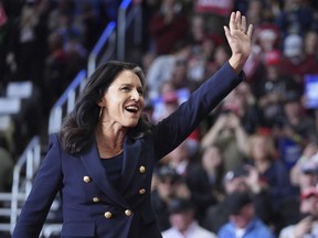 Tulsi Gabbard arrives before Republican presidential nominee former President Donald Trump speaks at a campaign rally at PPG Paints Arena, Monday, Nov. 4, 2024, in Pittsburgh, Pa.