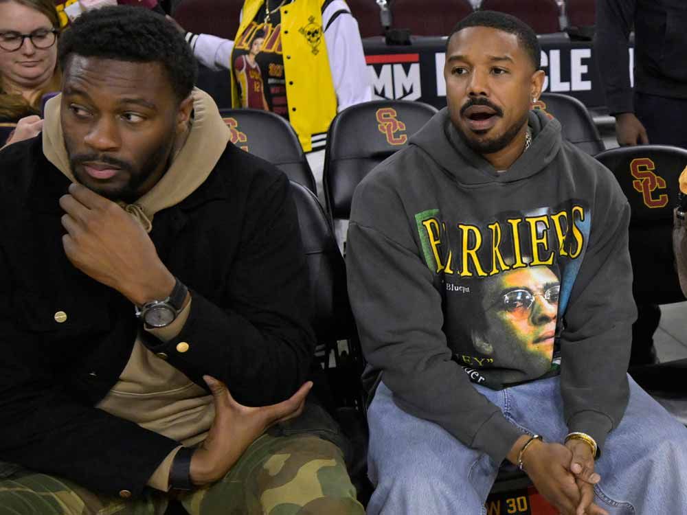 Michael B. Jordan uses timeout at women’s college basketball game to sign smoldering photo