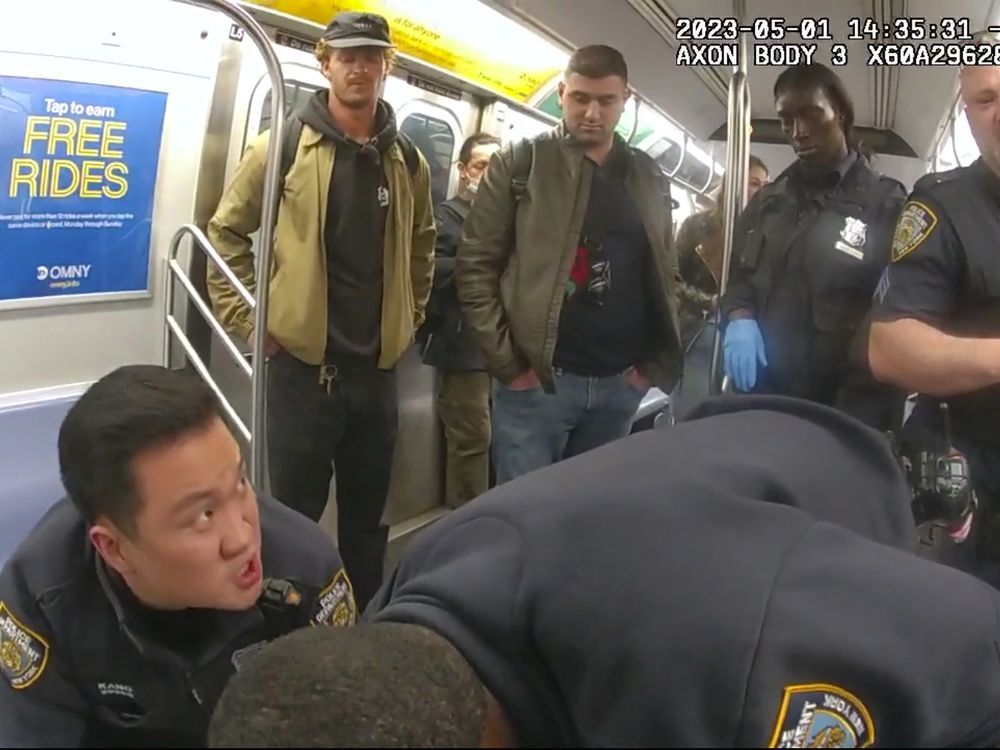  this image from body camera video provided by new york city police department, penny, standing at left, looks on in a new york city subway car as officers attempt to revive jordan neely onmay 5, 2023. (new york city police department via ap)