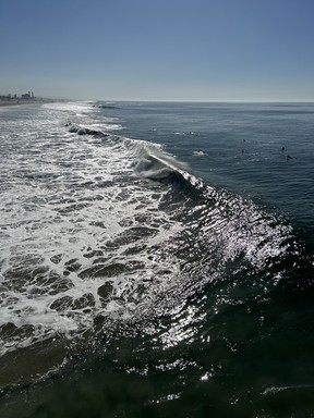 The Huntington Beach pier is a perfect vantage point to watch the surf and the surfers on a perfect SoCal morning. ROB LONGLEY/TORONTO SUN