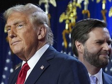 Republican presidential nominee former President Donald Trump, left, with Republican vice presidential nominee Sen. JD Vance, R-Ohio, right, at an election night watch party at the Palm Beach Convention Center, Wednesday, Nov. 6, 2024, in West Palm Beach, Fla.