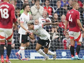 Liverpool's Luis Diaz celebrates after scoring his side's second goal against Manchester United.