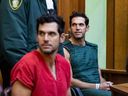 Alon Alexander, 37, right, and his twin brother, Oren, left, attend their bond hearing at the Richard E. Gerstein Justice Building on Dec. 13, 2024 in Miami, Fla.
