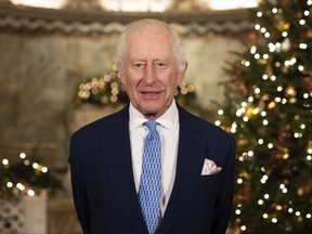 King Charles speaks during the recording of his Christmas message.