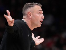 Toronto Raptors head coach Darko Rajakovic reacts to a call.