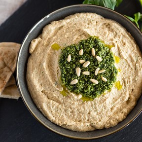 Homemade hummus with pesto.