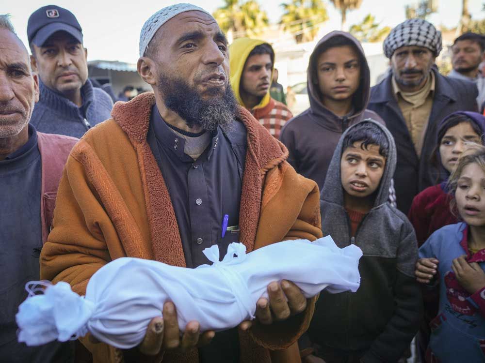 Fourth infant dies of hypothermia in Gaza as families share blankets in seaside tents