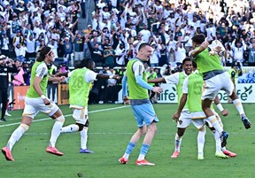 Los Angeles Galaxy players celebrate after winning the MLS Cup Final match against the New York Red Bulls at the Dignity Health Sports Park in Carson, Calif., Saturday, Dec. 7, 2024.