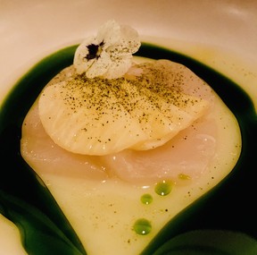 Aguachile of scallop crudo with tender slices of pickled rutabaga at Alma restaurant in Montreal.