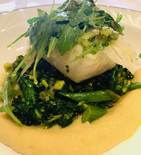 The finale of Top Chef, Season 11 was filmed at Le 9e in the Eaton Centre in Montreal. On its menu is a delicately poached halibut filet served with parsnip puree.