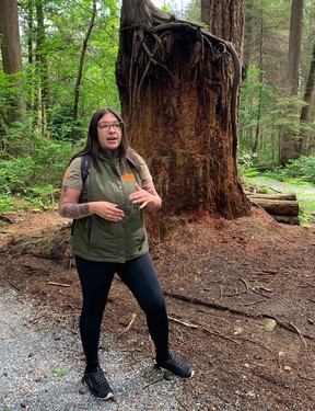 Talaysay Tours guide Seraphine Lewis, who has Squamish and Haida Indigenous heritage, is guiding travellers this day on the Talking Trees expedition through Stanley Park in Vancouver.