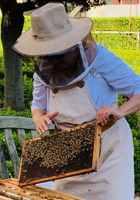 Lucky Fairmont Vancouver Waterfront guests can get up close and personal when chief beekeeper Julia Common tends to slatted racks ripe with honeycomb.