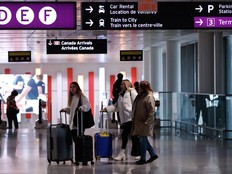 Travellers make their way through Pearson International Airport in Toronto, Monday, Nov. 14, 2022.