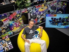 This picture taken on Aug. 29, 2024 shows Nicolas Doucet, a Frenchman who heads the Japanese studio Team Asobi behind the video game "Astro Bot," posing with a stuffed toy for upcoming game during an interview with AFP at the offices of Sony Interactive Entertainment in Tokyo.