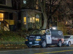 A Toronto Police van is pictured outside of Crossroads Community Residential Facility at 419 Jones Ave. in Toronto on Dec. 9, 2024. (Ernest Doroszuk, Toronto Sun)