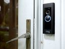 A doorbell device with a built-in camera made by home security company Ring is seen in August 2019 in Silver Spring, Maryland.