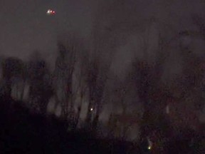 In this image taken from video, what appears to be drones flying over Randolph, N.J., Dec. 4, 2024.